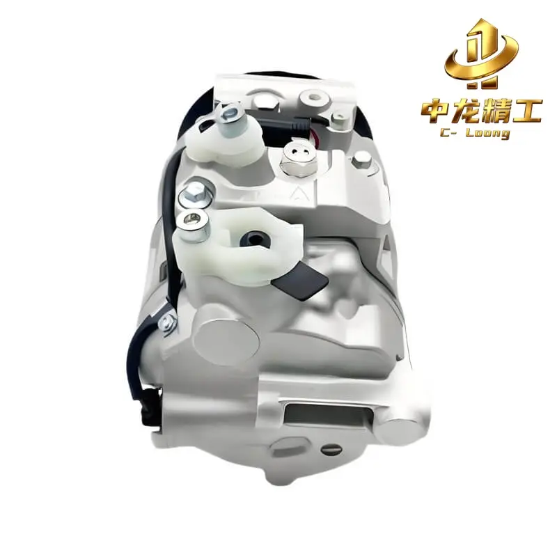 Mercedes E-Class AC compressor, rear view of capped refrigerant ports and wiring