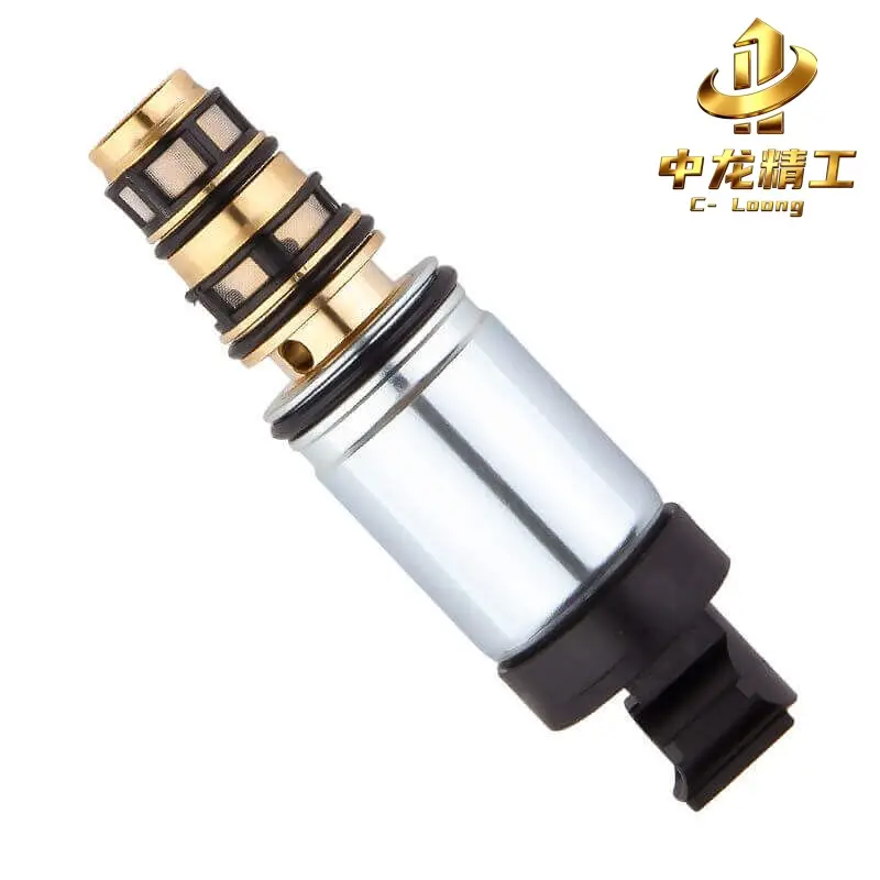 VW Polo AC compressor control valve with brass-coloured cartridge, filter screens, silver body and black straight connector